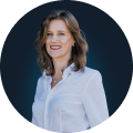 Portrait photo of smiling marketing specialist looking at the user.